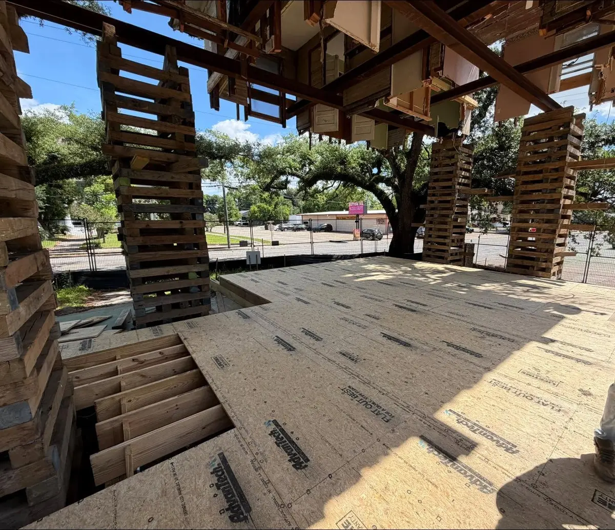 View beneath a raised home with new subfloor