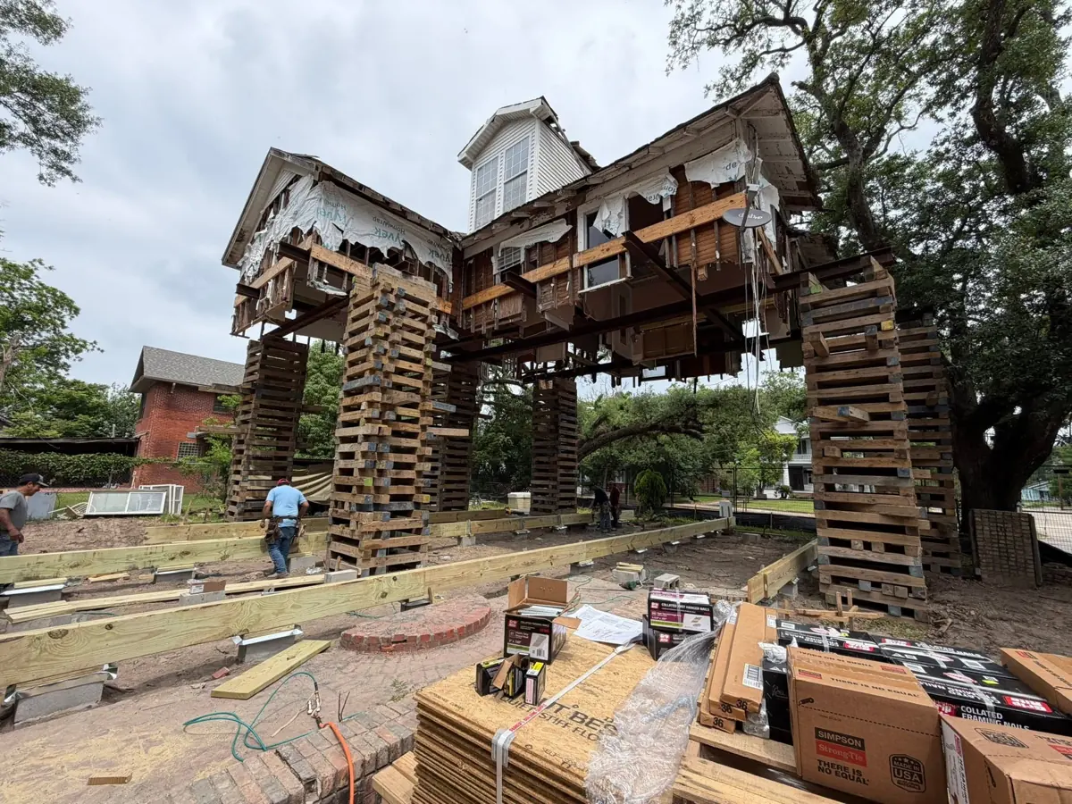 Home raised on cribbing during a rebuild